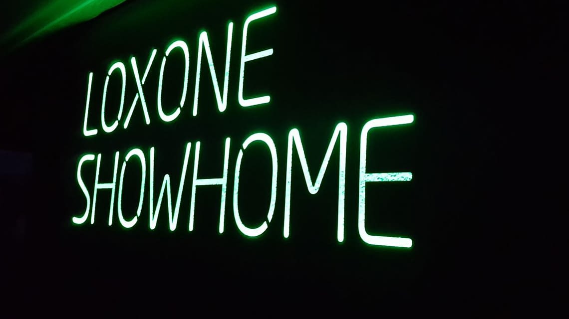 Das Unternehmens-Grün begrüßt Besucher im Showhome