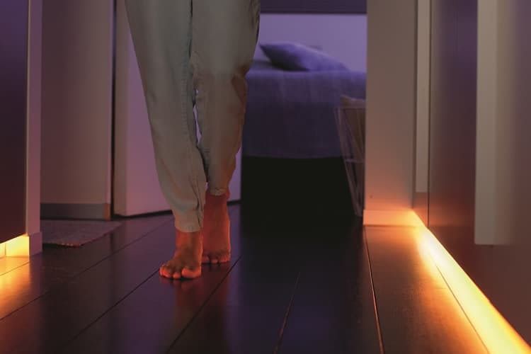 Light strips (here from Philips Hue) set nice accents and reduce the risk of tripping
