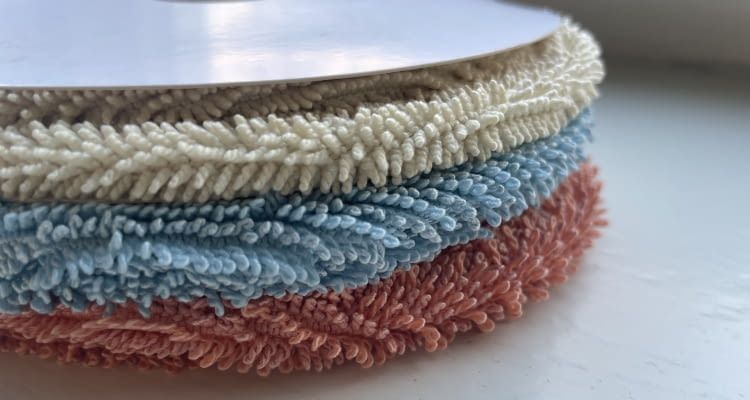 Die drei zur Verfügung stehenden Mopps: ThermoHold (rot), HyperClean (blau), Plüsch (gelb)