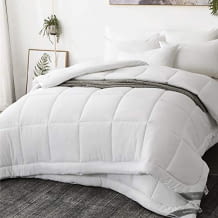 Für alle Jahreszeiten: Zwei Bettdecken, die im Winter mit Druckknöpfen zu einer zusammengemacht werden können.