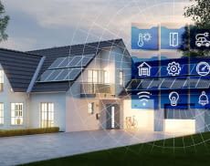 Haus mit Garage am Abend mit Smart Home Technologie