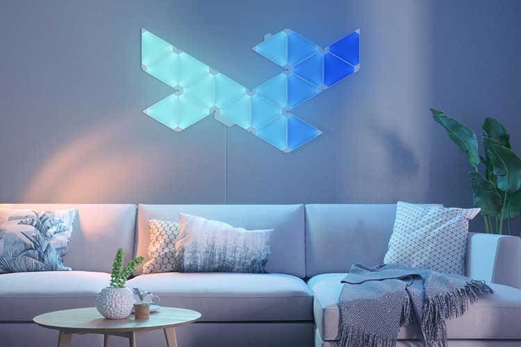 Die dreieckigen Nanoleaf Light Panels Rythm synchronisieren sich auf Wunsch mit Musik und Geräuschen Die dreieckigen Nanoleaf Light Panels Rythm synchronisieren sich auf Wunsch mit Musik und Geräuschen